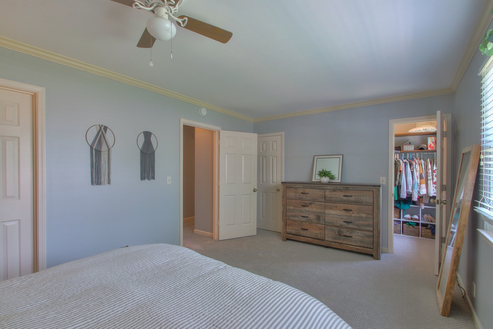 1016 General George Patton Road Nashville, TN 37221 - Photo 14 of 23 a bedroom with a bed and cabinets