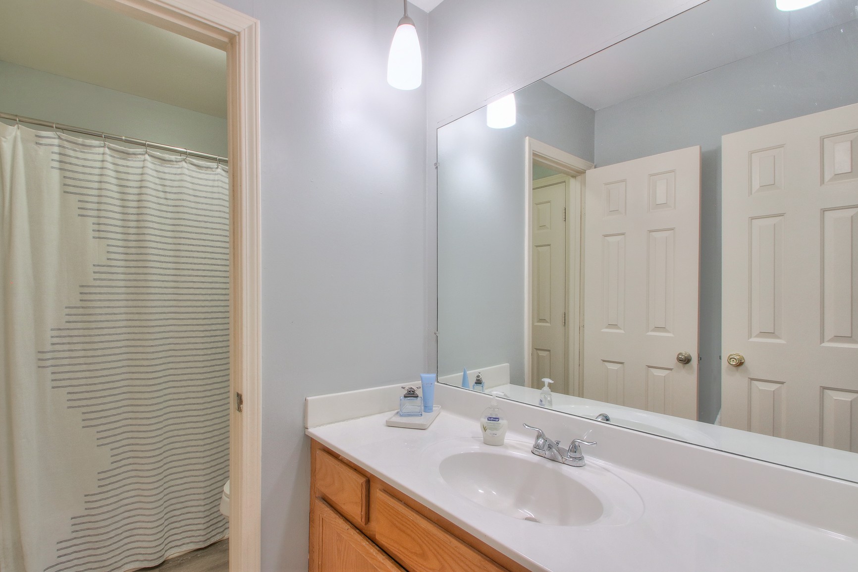 1016 General George Patton Road Nashville, TN 37221 - Photo 15 of 23 a bathroom with a sink and a mirror