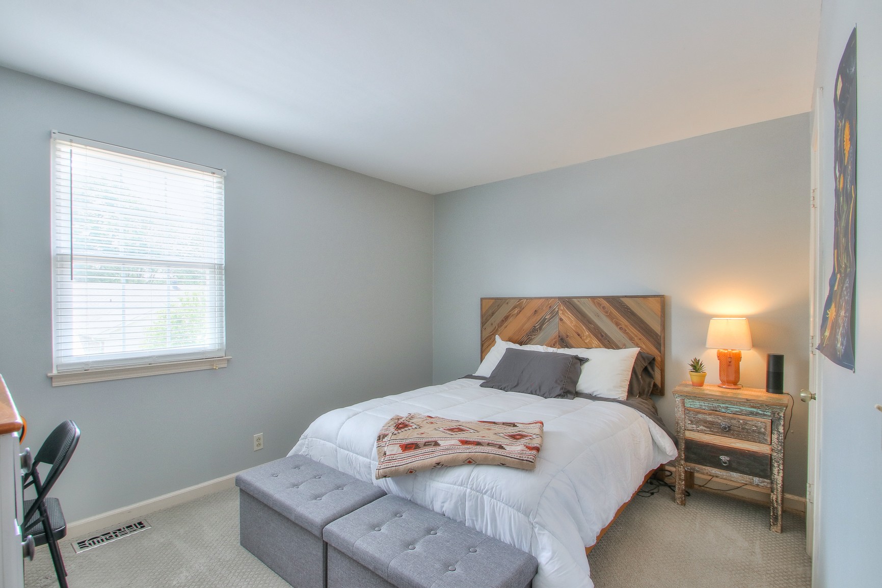 1016 General George Patton Road Nashville, TN 37221 - Photo 16 of 23 a bedroom with a bed and window