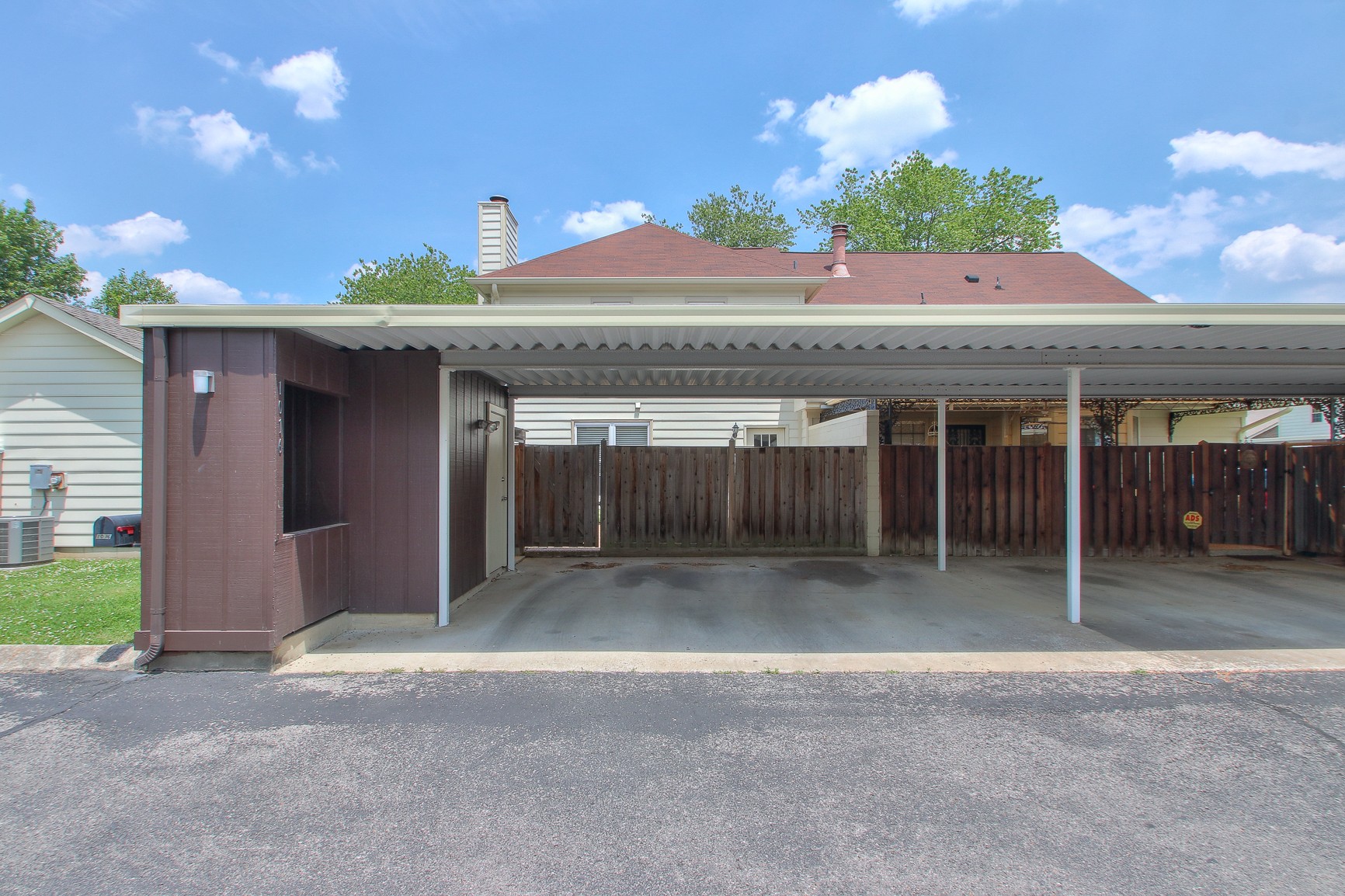 1016 General George Patton Road Nashville, TN 37221 - Photo 21 of 23 a front view of a house with a garden and garage