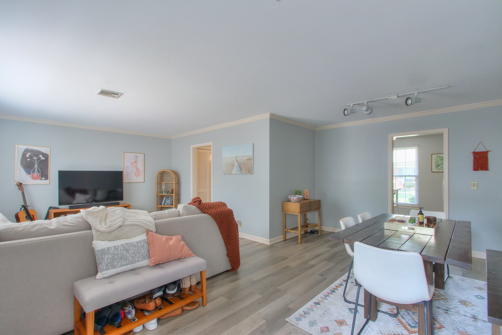 1016 General George Patton Road Nashville, TN 37221 - Photo 6 of 23 a living room with furniture fireplace and a table