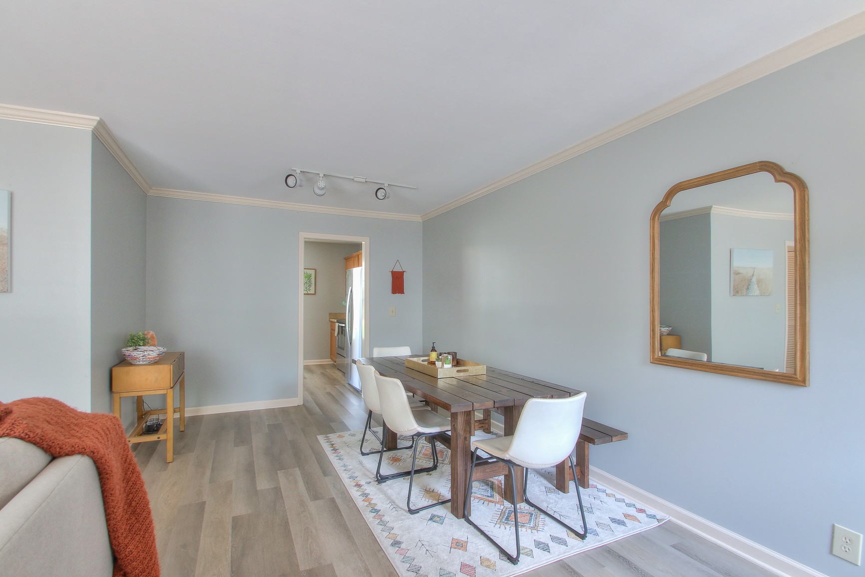 1016 General George Patton Road Nashville, TN 37221 - Photo 10 of 23 a dining room with furniture and wooden floor