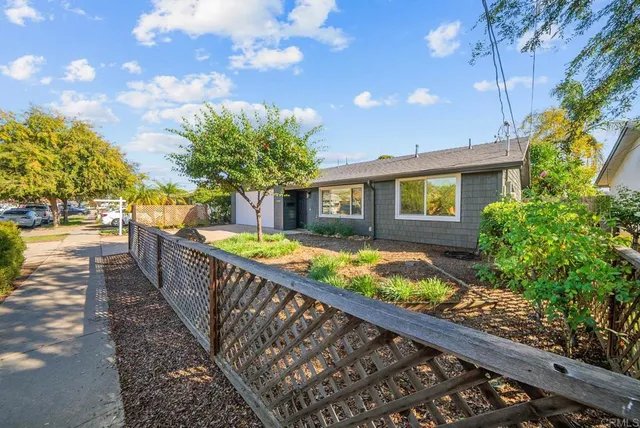 a view of balcony with wooden floor