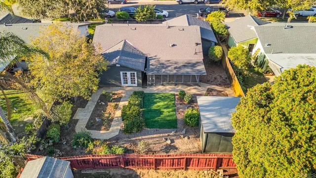 an aerial view of a house with swimming pool
