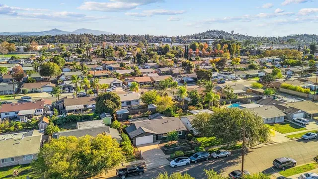 an aerial view of a city with lots of residential buildings