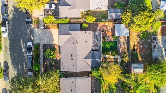 an aerial view of multiple house with outdoor space