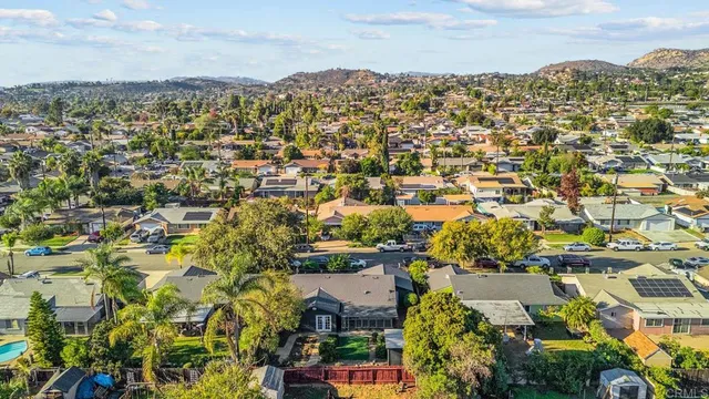 an aerial view of residential building and parking space