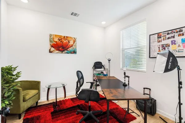 a room with furniture and a window