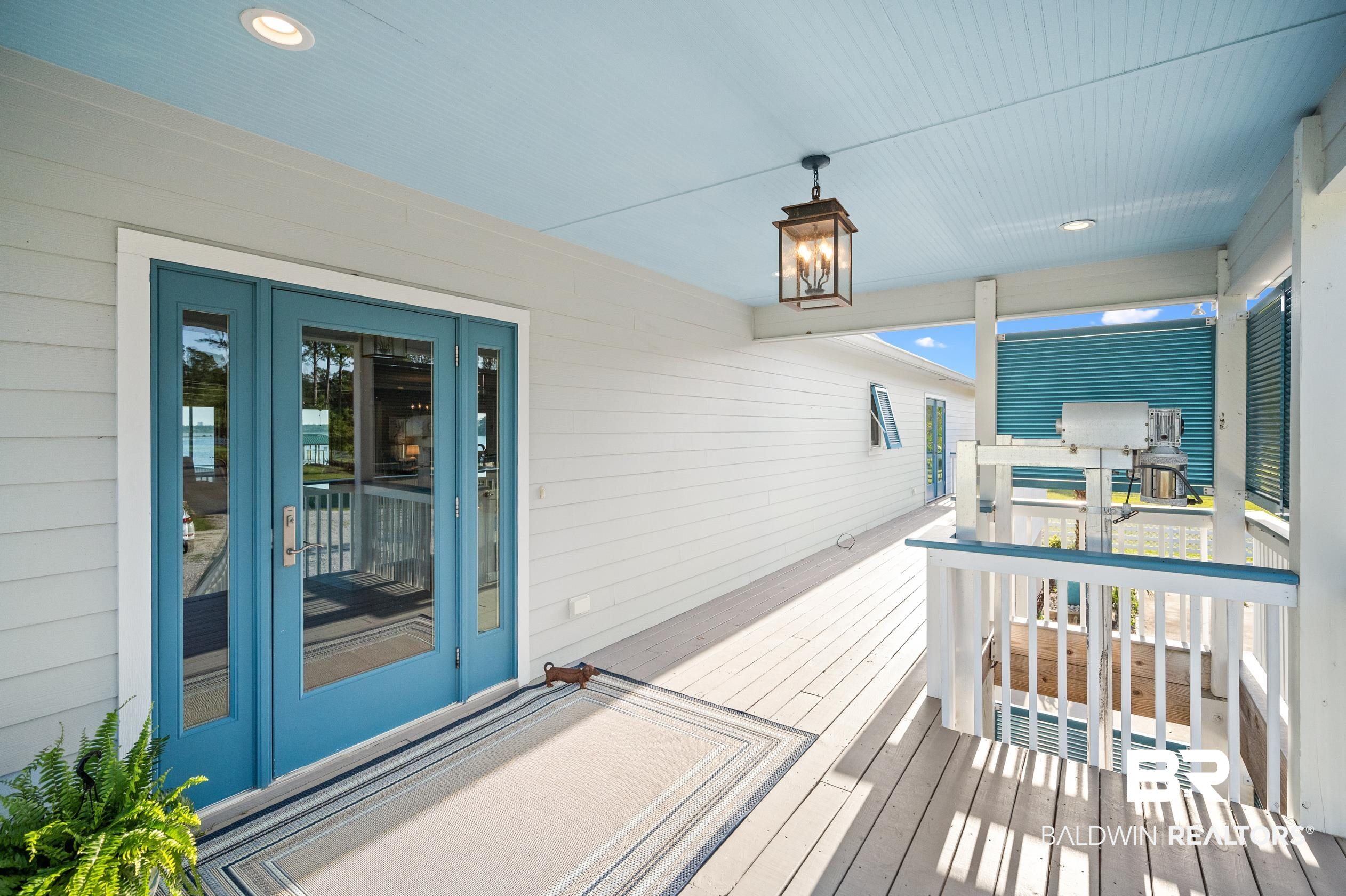 17188 Oyster Bay Road Gulf Shores, AL 36542 - Photo 5 of 47 Front Porch & Cargo Lift