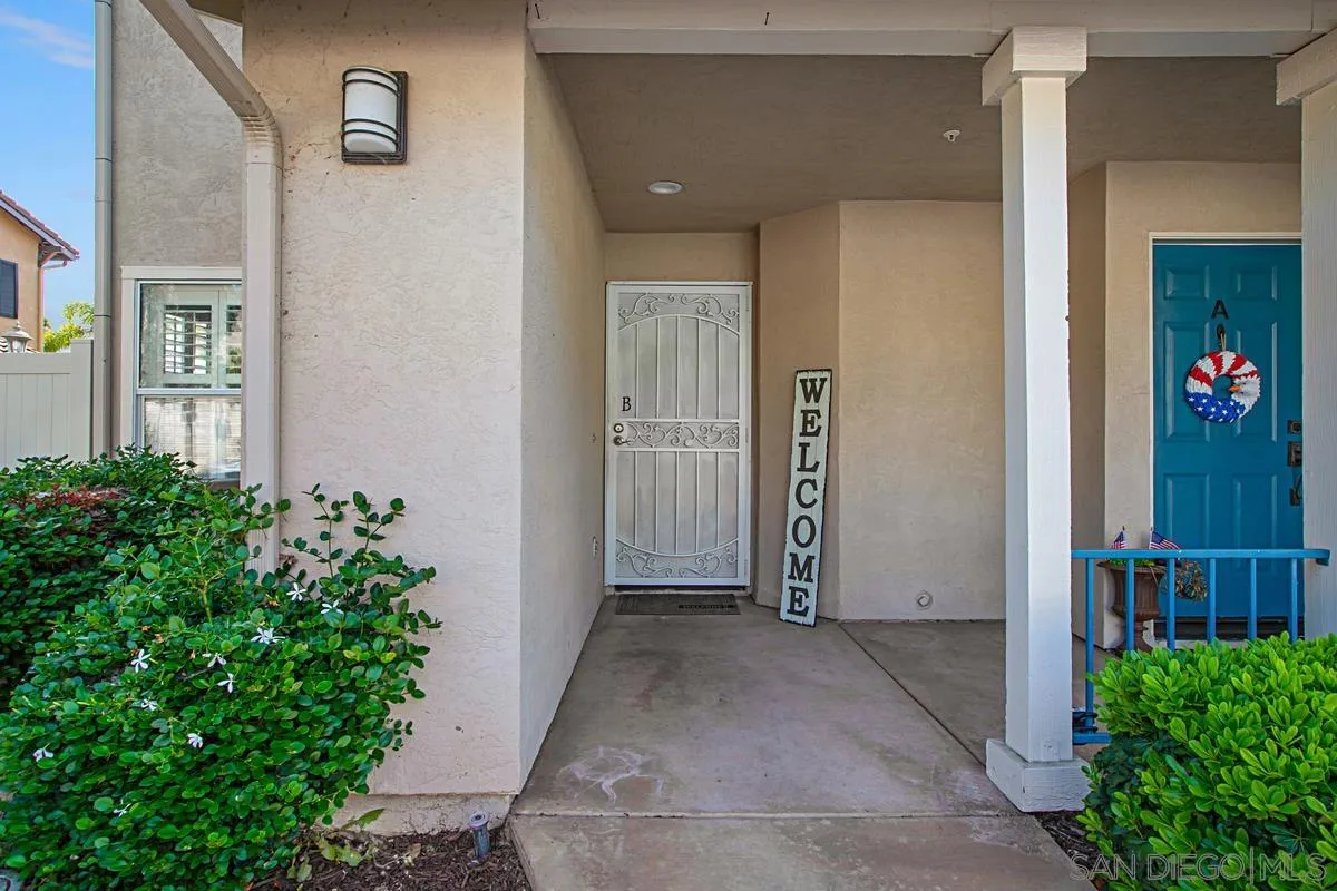 405 Whispering Willow Drive, Unit B Santee, CA 92071 - Photo 29 of 29 a view of a house with a backyard