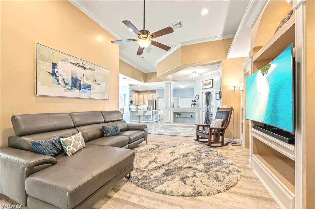 267 Glen Eagle Circle Naples, FL 34104 - Photo 3 of 19 Soaring ceilings in large living room