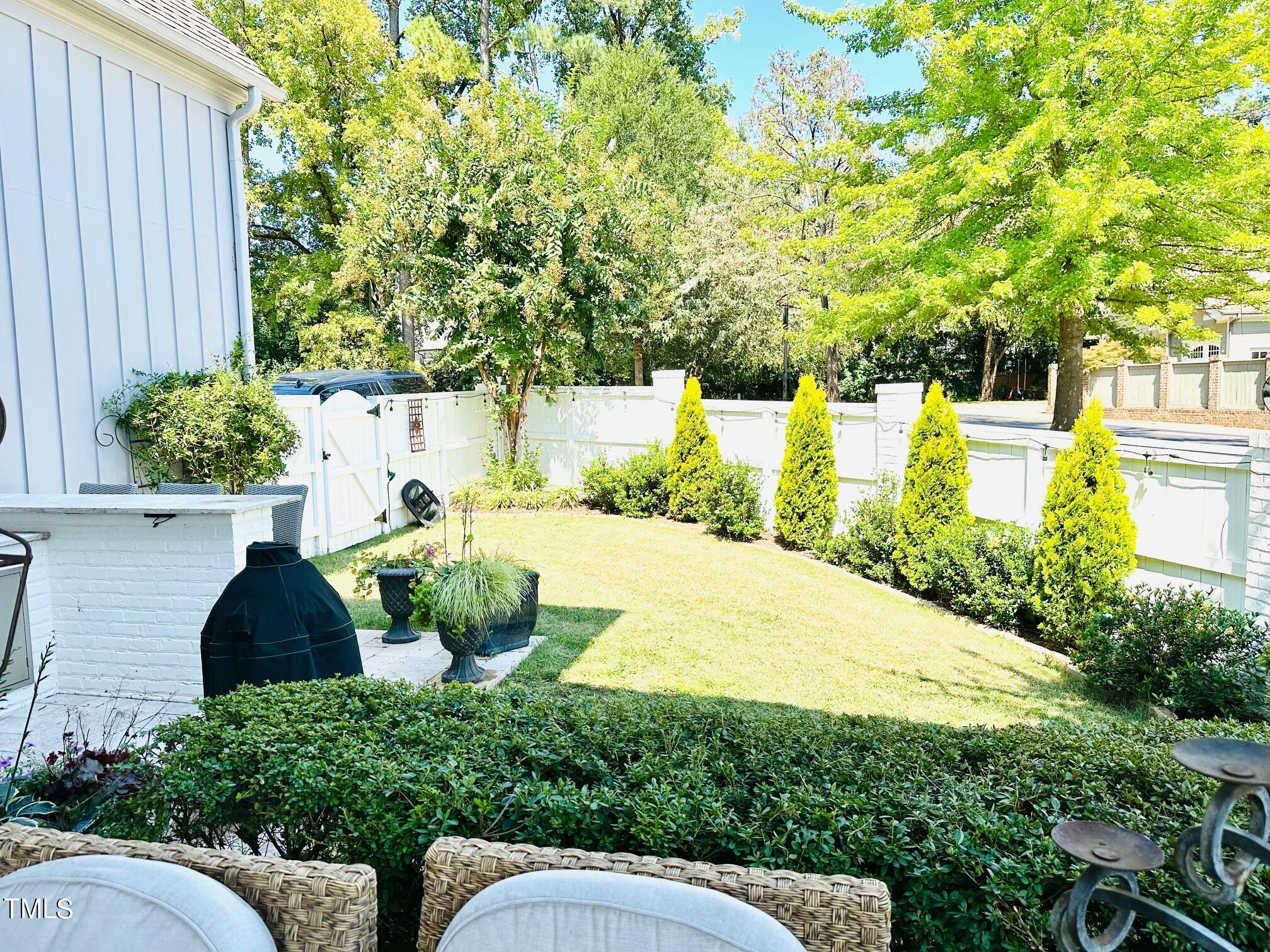 543 Guilford Circle Raleigh, NC 27608 - Photo 17 of 46 a view of a garden