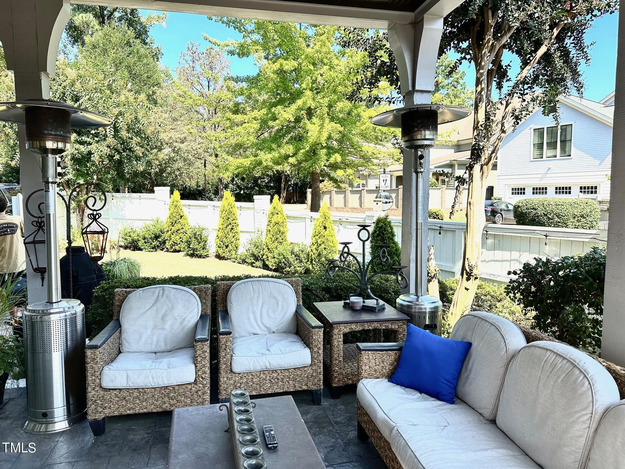 543 Guilford Circle Raleigh, NC 27608 - Photo 19 of 46 a outdoor living room with furniture and a potted plant