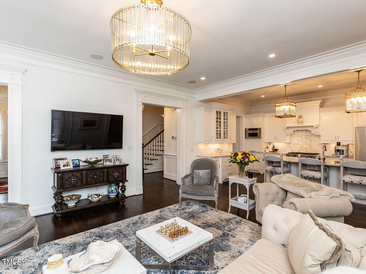 543 Guilford Circle Raleigh, NC 27608 - Photo 22 of 46 a living room with furniture and a flat screen tv