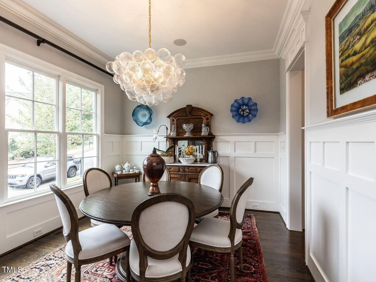543 Guilford Circle Raleigh, NC 27608 - Photo 24 of 46 a view of a dining room with furniture window and wooden floor