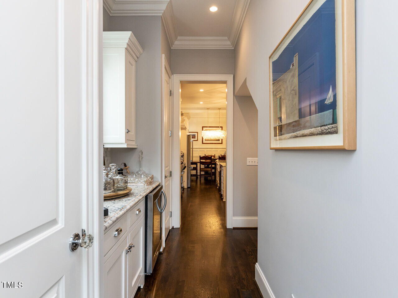 543 Guilford Circle Raleigh, NC 27608 - Photo 26 of 46 a hallway with wooden floor