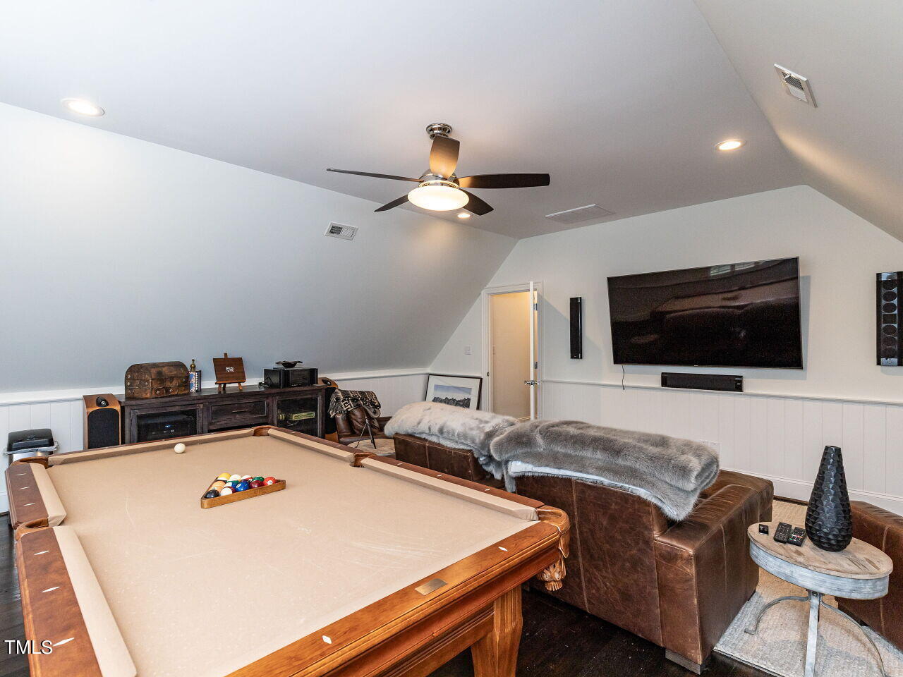 543 Guilford Circle Raleigh, NC 27608 - Photo 34 of 46 a living room with furniture and a flat screen tv