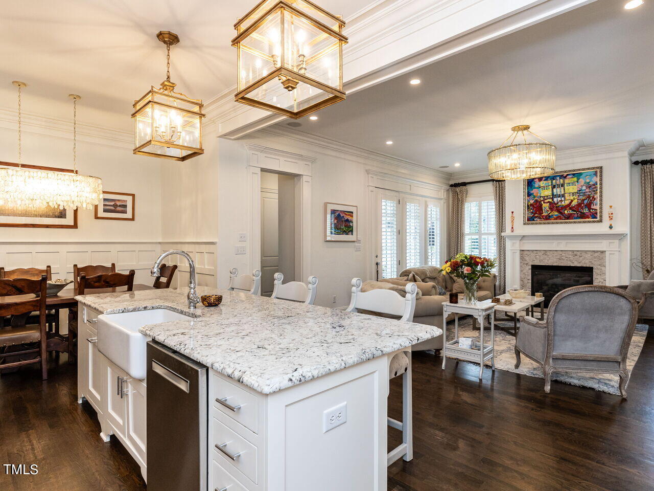 543 Guilford Circle Raleigh, NC 27608 - Photo 4 of 46 a view of a kitchen wooden floor and a chandelier