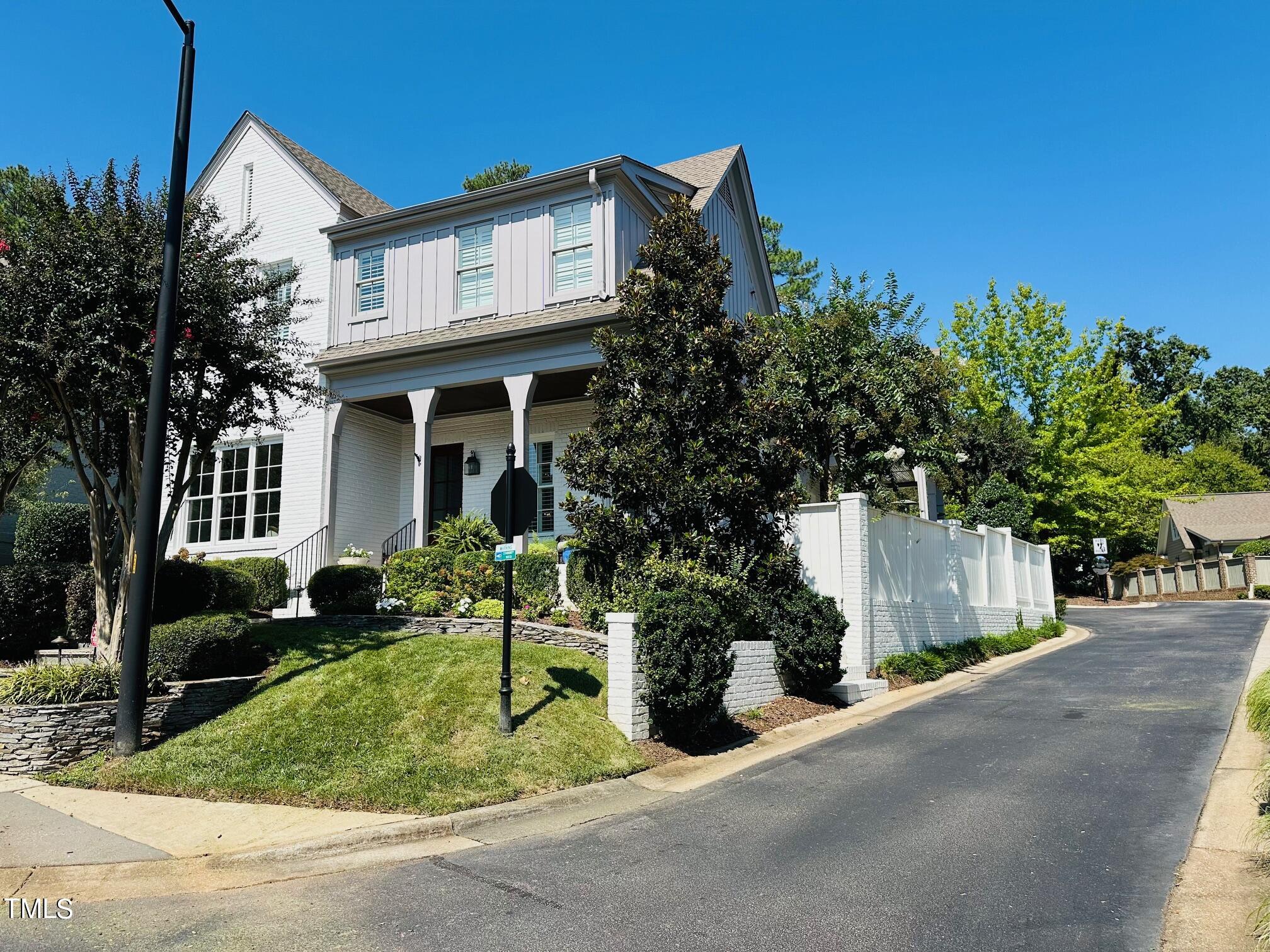 543 Guilford Circle Raleigh, NC 27608 - Photo 41 of 46 a front view of a house with a yard