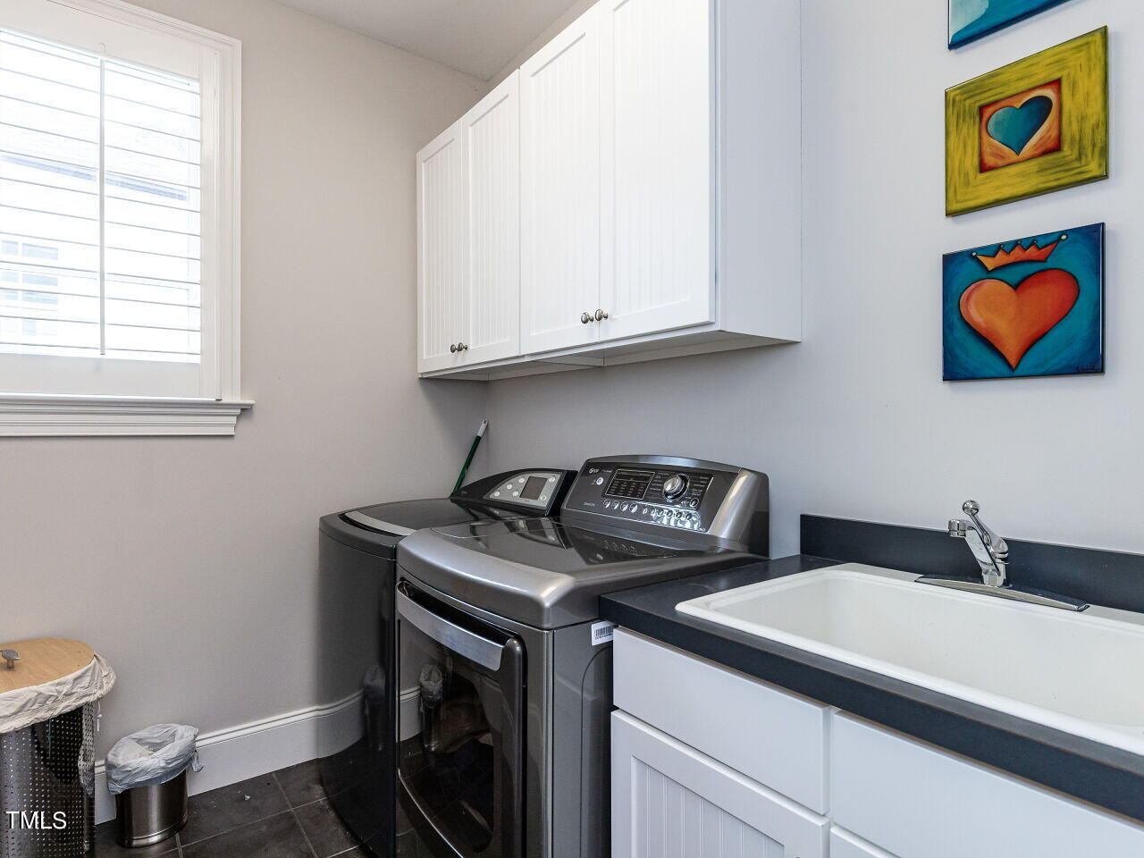 543 Guilford Circle Raleigh, NC 27608 - Photo 46 of 46 a utility room with dryer and washer