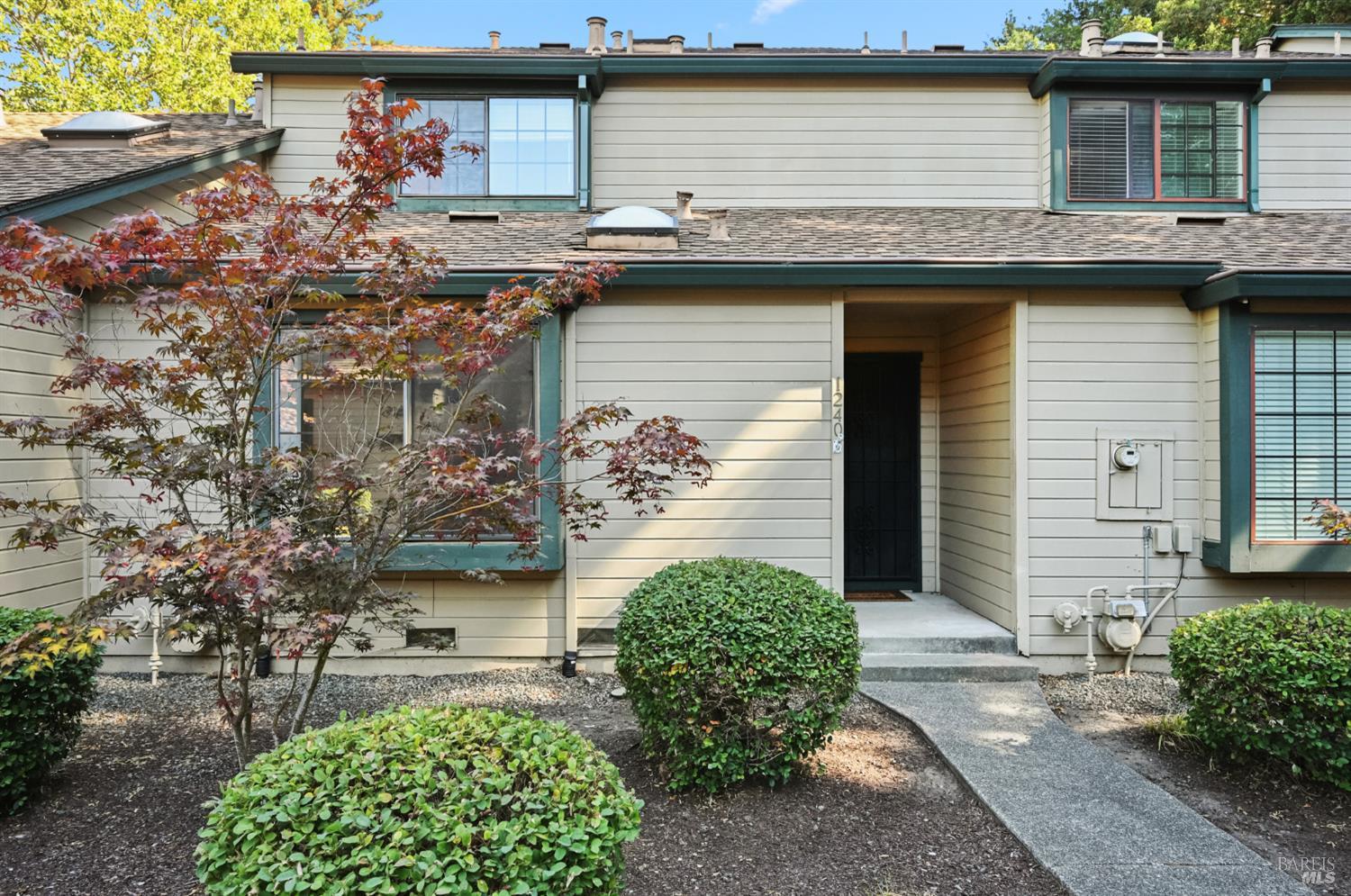 a view of a house with a patio