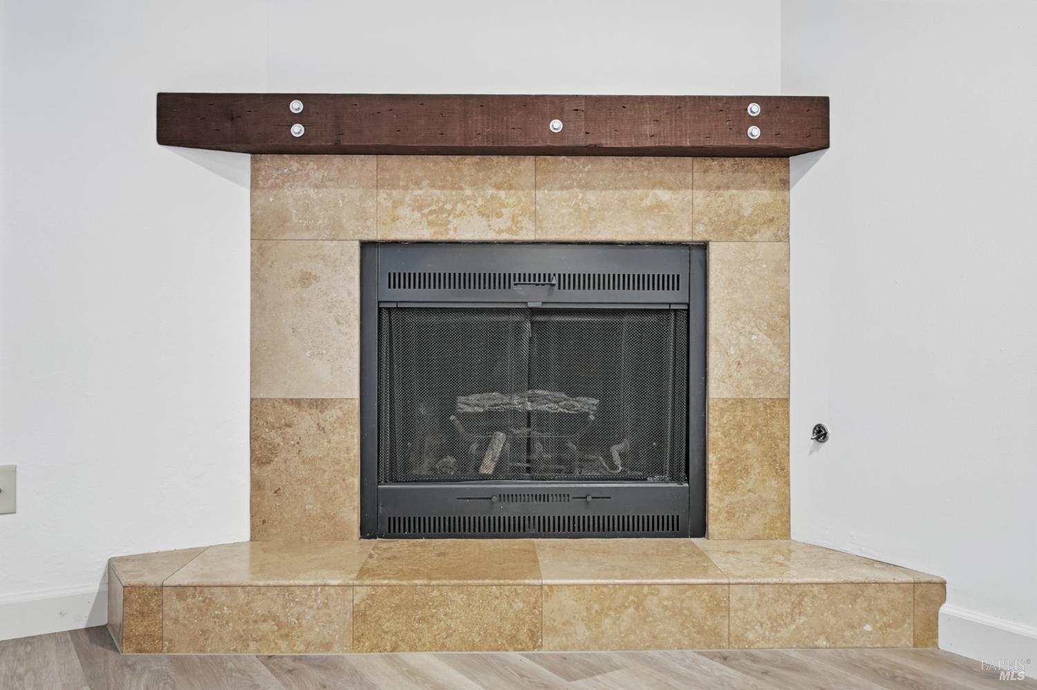 1240 North Street Santa Rosa, CA 95404 - Photo 15 of 36 a fireplace with a hallway