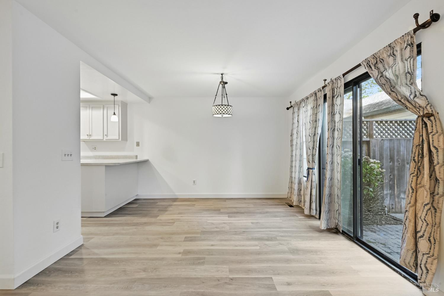1240 North Street Santa Rosa, CA 95404 - Photo 17 of 36 a view of an entryway with wooden floor and door