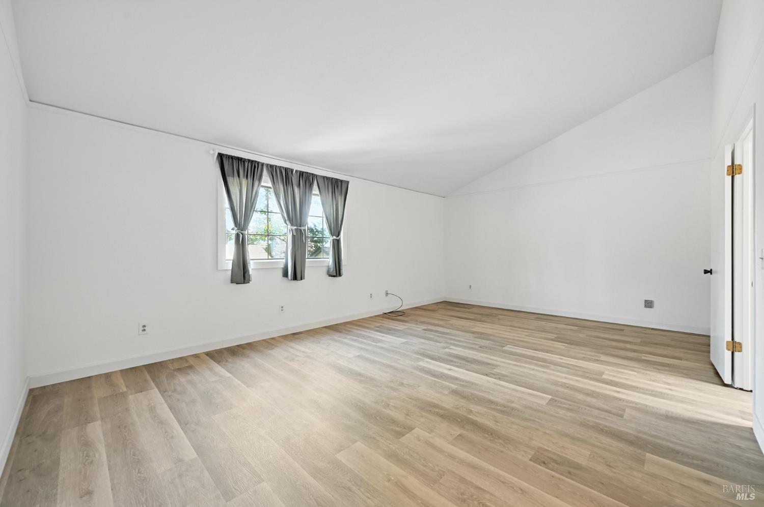 1240 North Street Santa Rosa, CA 95404 - Photo 27 of 36 an empty room with windows