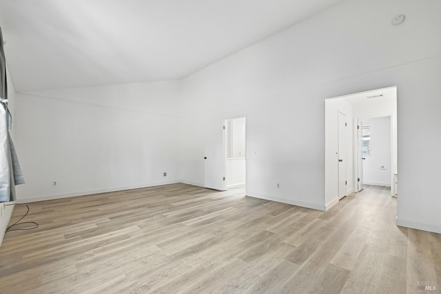 1240 North Street Santa Rosa, CA 95404 - Photo 29 of 36 a view of an empty room and wooden floor