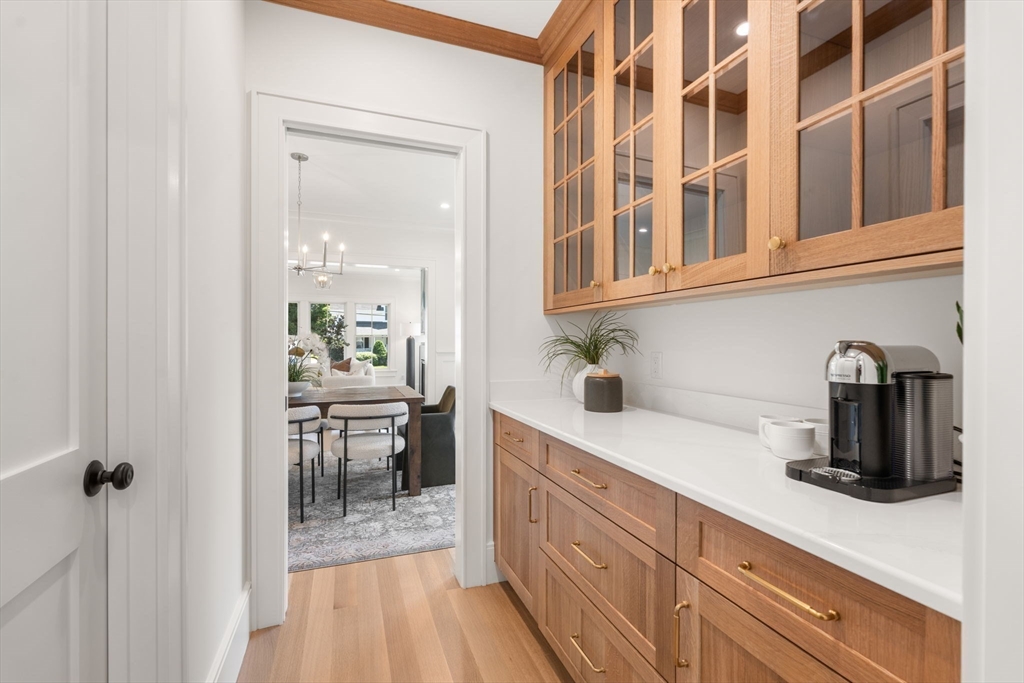 233 Warren Street Needham, MA 02492 - Photo 6 of 32 a kitchen with cabinets and window