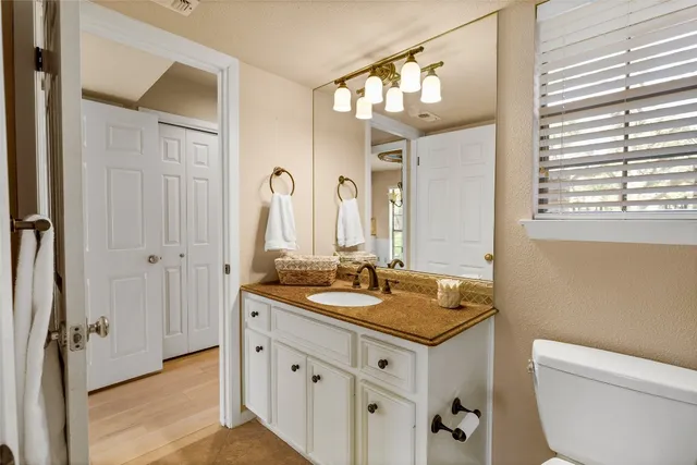 an empty room with a empty space and windows