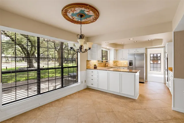 a open kitchen with a large window