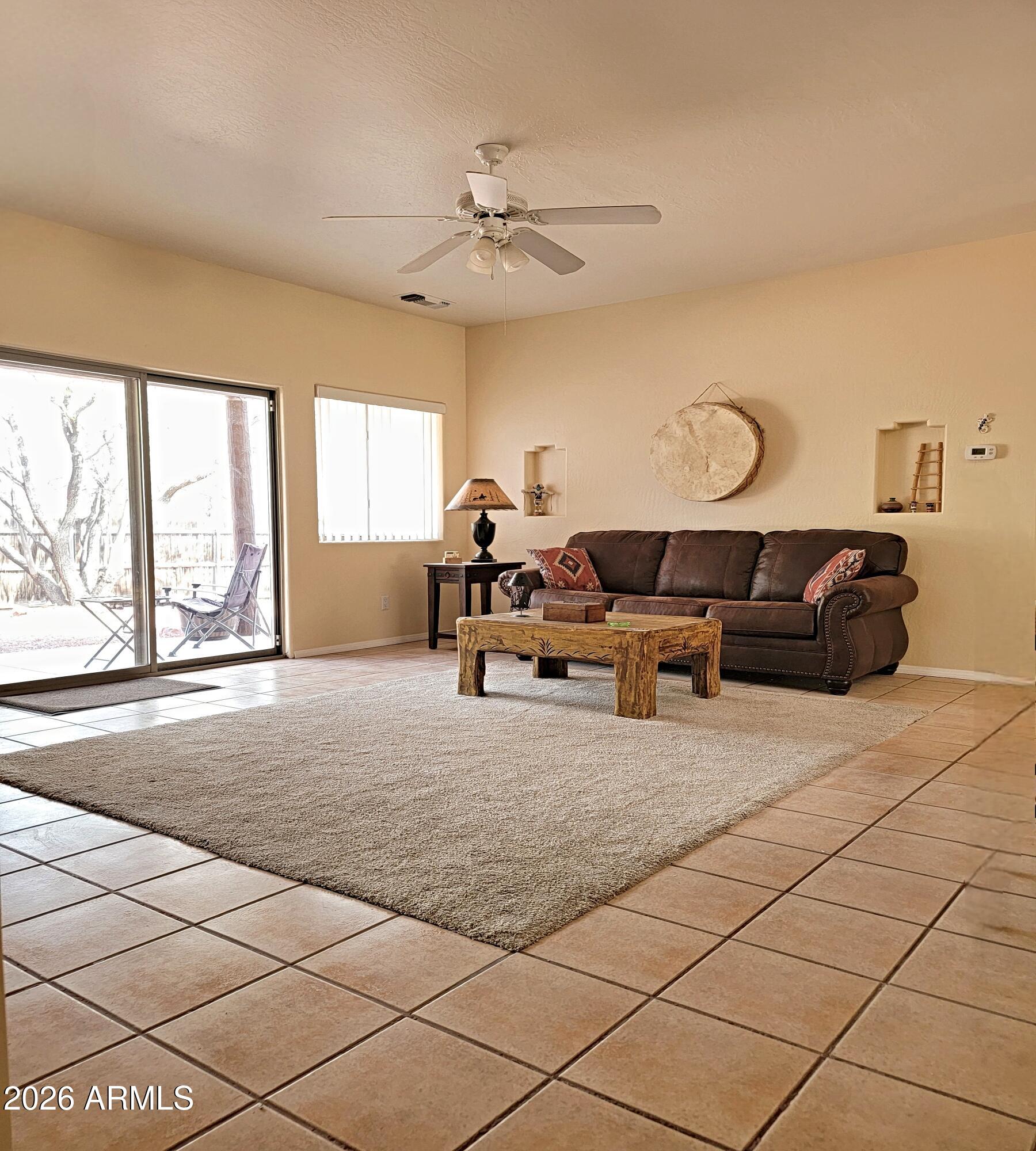 5665 North Vicki Lane Rimrock, AZ 86335 - Photo 4 of 27 a living room with furniture and a large window