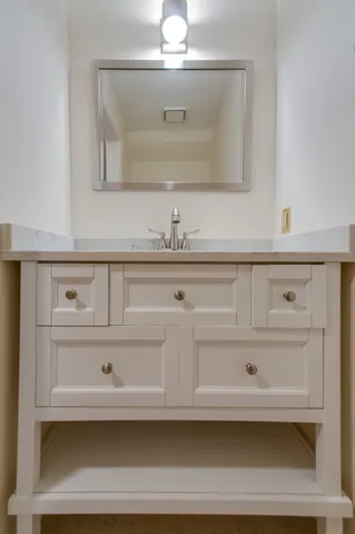 a view of hallway with wooden floor