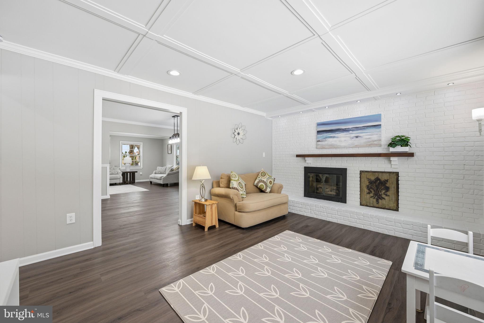 1708 Tarleton Way Crofton, MD 21114 - Photo 11 of 38 a living room with furniture and a fireplace
