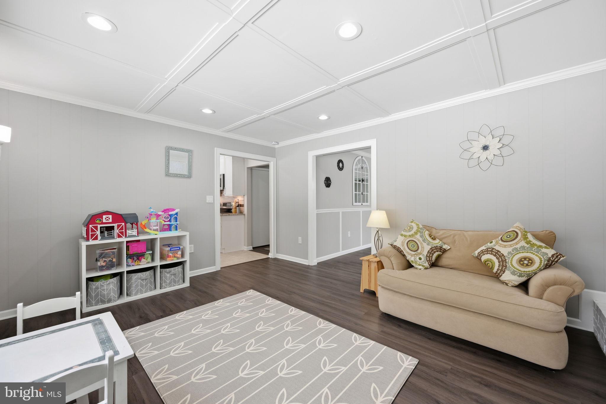 1708 Tarleton Way Crofton, MD 21114 - Photo 12 of 38 a living room with furniture and a table