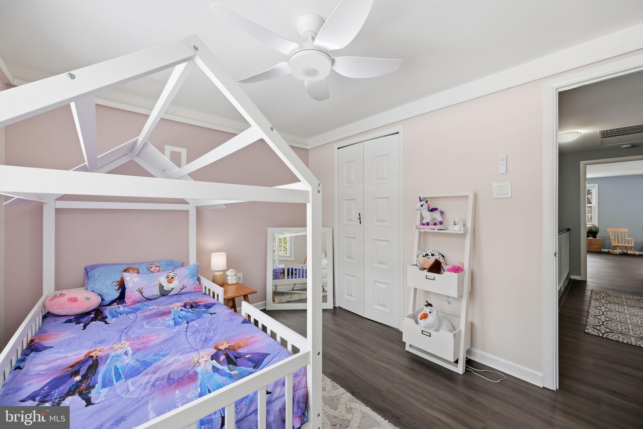 1708 Tarleton Way Crofton, MD 21114 - Photo 17 of 38 a bedroom with a bed and wooden floor