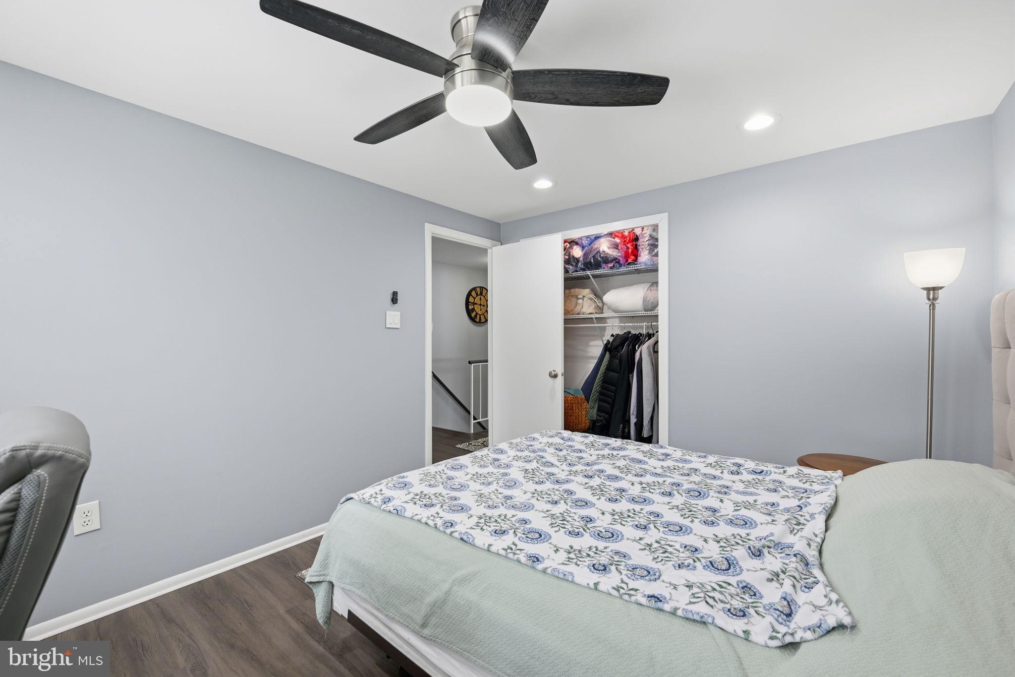 1708 Tarleton Way Crofton, MD 21114 - Photo 21 of 38 a bedroom with a bed and a chandelier