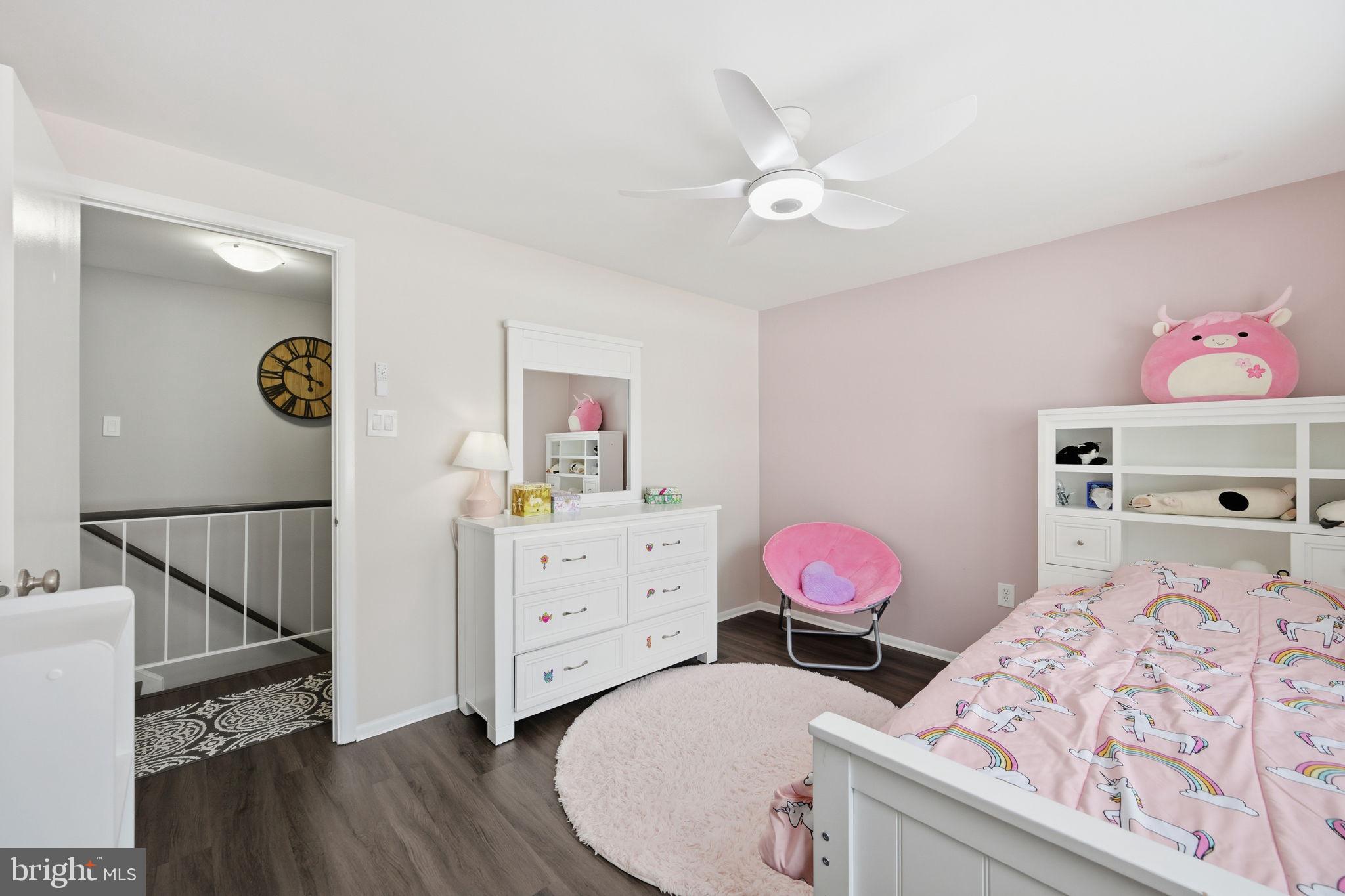 1708 Tarleton Way Crofton, MD 21114 - Photo 23 of 38 a bedroom with a bed and wooden floor