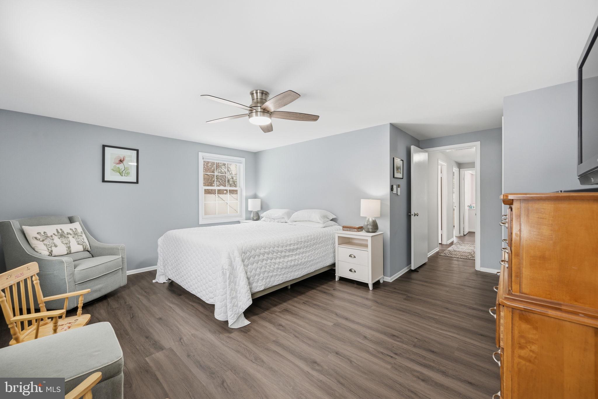 1708 Tarleton Way Crofton, MD 21114 - Photo 24 of 38 a spacious bedroom with a bed and a table