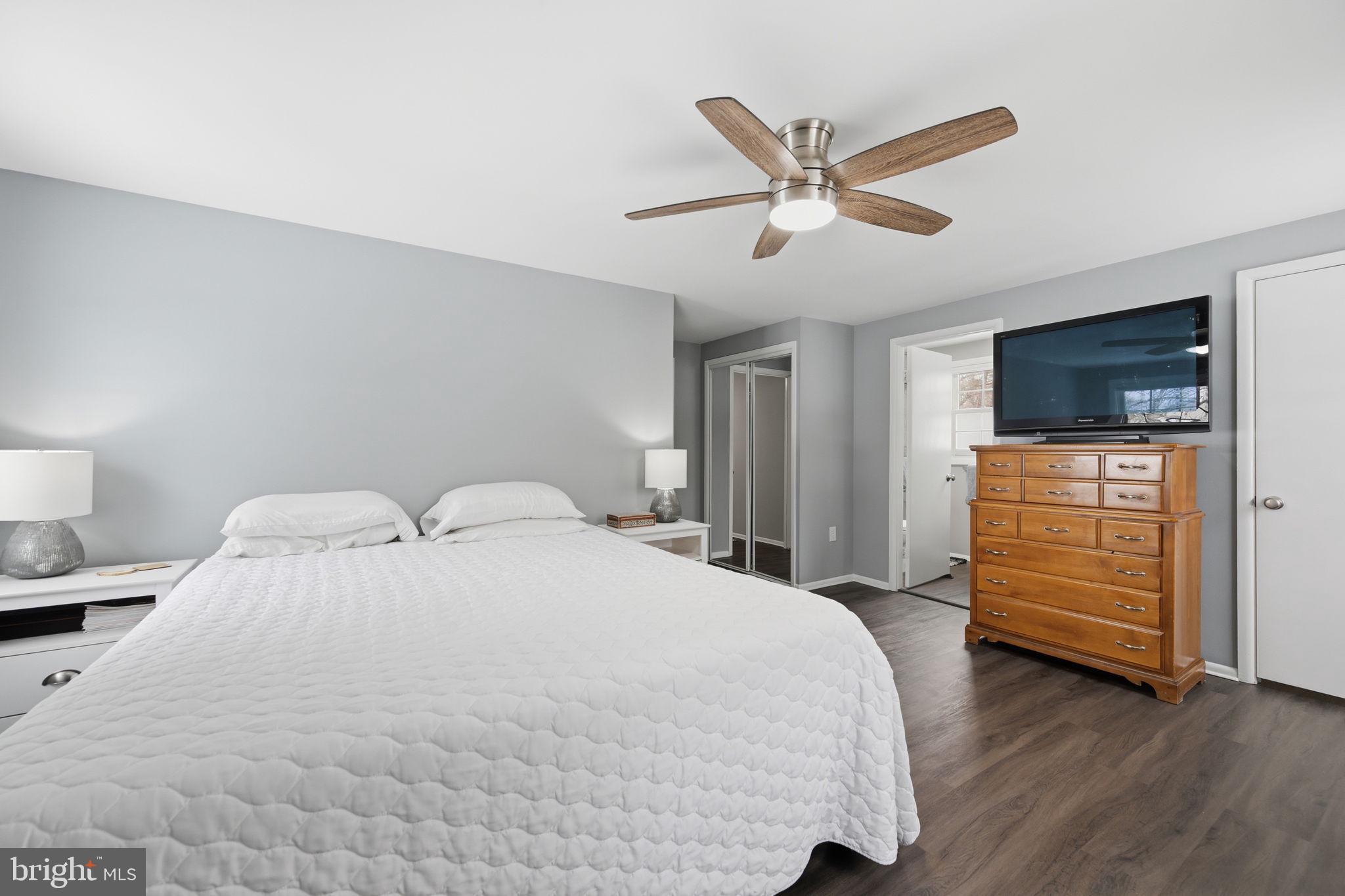 1708 Tarleton Way Crofton, MD 21114 - Photo 25 of 38 a bedroom with a bed and a flat screen tv