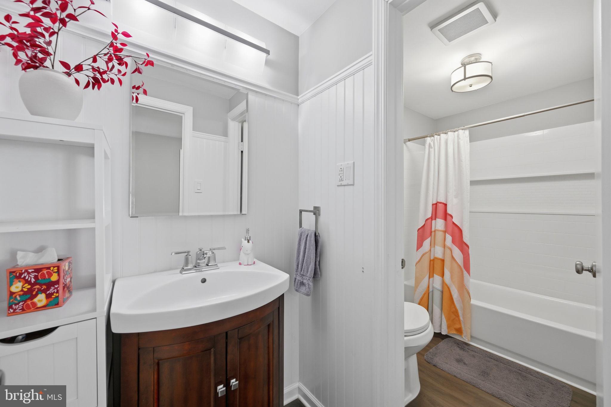 1708 Tarleton Way Crofton, MD 21114 - Photo 29 of 38 a bathroom with a sink vanity and tub