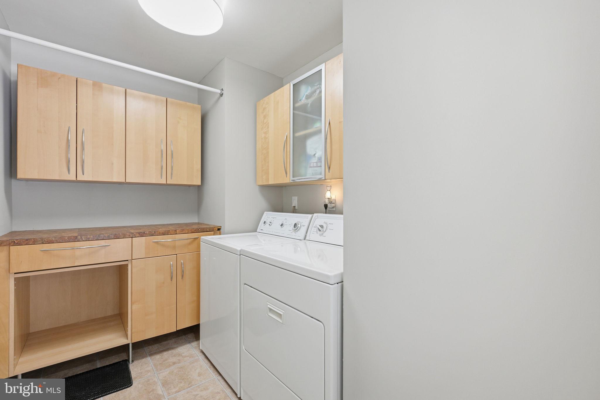 1708 Tarleton Way Crofton, MD 21114 - Photo 31 of 38 a view of storage and utility room with washer and dryer