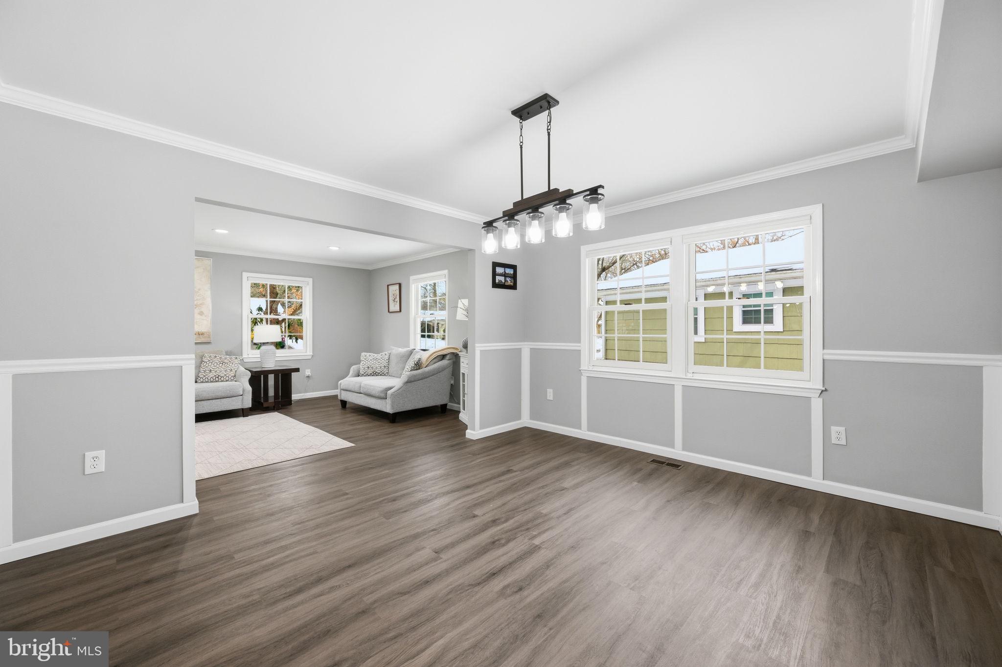 1708 Tarleton Way Crofton, MD 21114 - Photo 6 of 38 a view of a livingroom with furniture wooden floor and windows