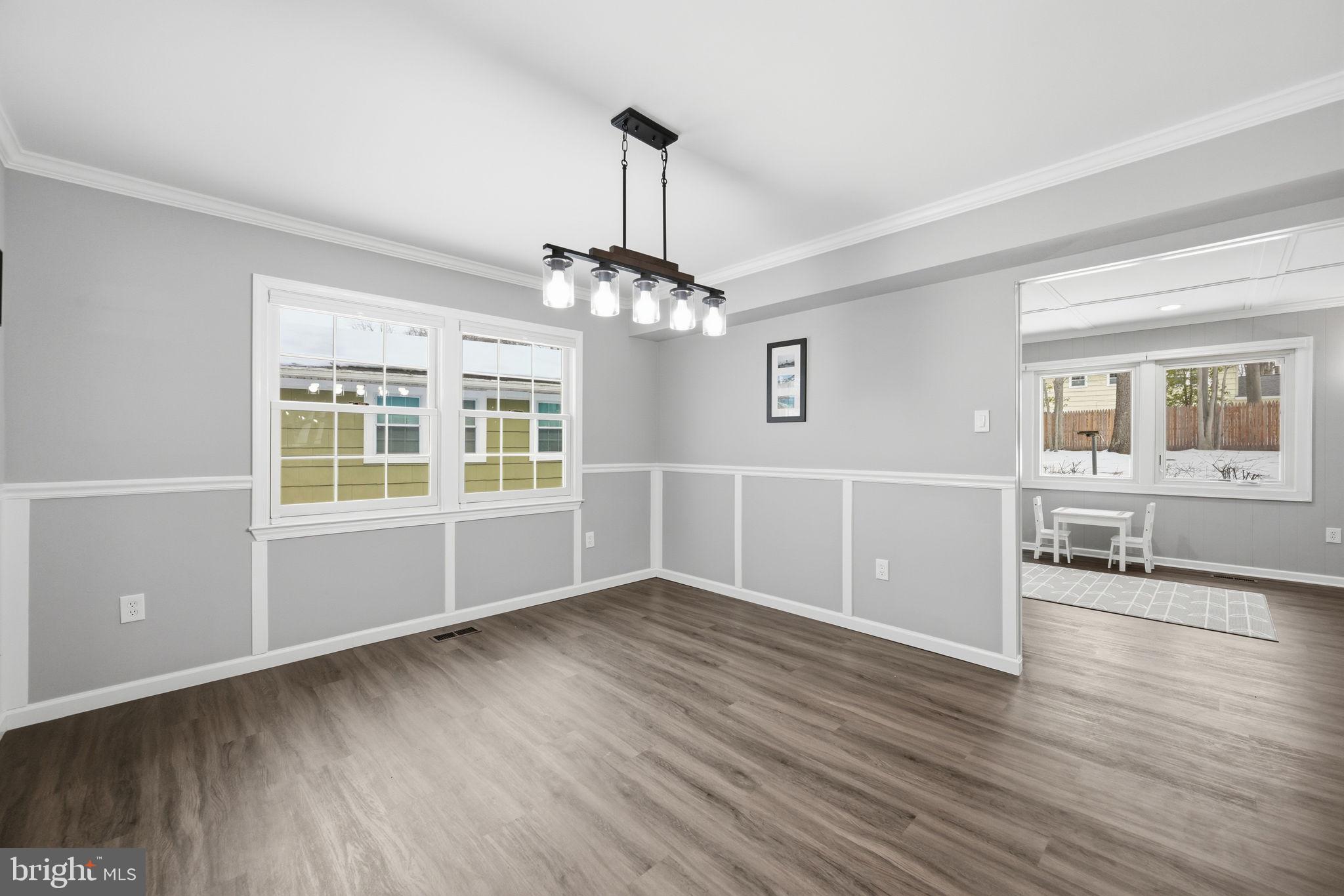 1708 Tarleton Way Crofton, MD 21114 - Photo 9 of 38 a view of livingroom with hardwood floor and window