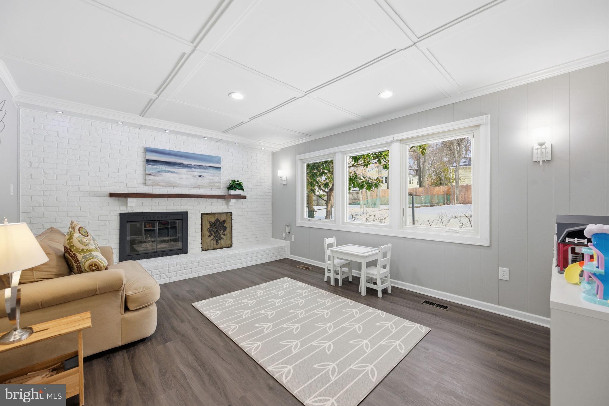 1708 Tarleton Way Crofton, MD 21114 - Photo 10 of 38 a living room with furniture and a fireplace