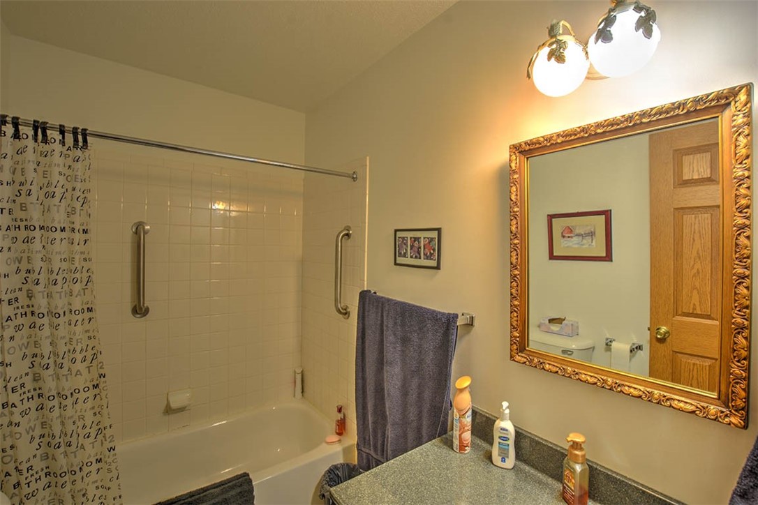 3055 Long Creek Road Decatur, IL 62521 - Photo 19 of 29 a bathroom with a sink and a shower