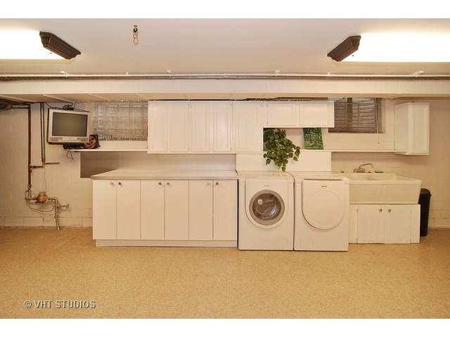 229 Blackhawk Road Riverside, IL 60546 - Photo 13 of 25 a utility room with dryer and washer