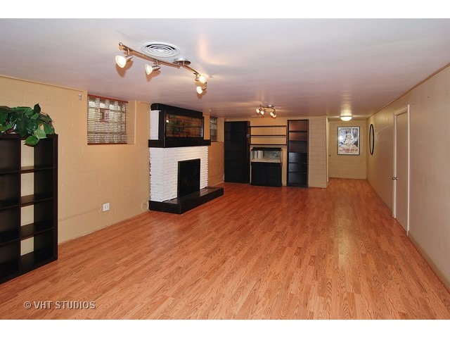 229 Blackhawk Road Riverside, IL 60546 - Photo 14 of 25 a view of a kitchen with a sink and a refrigerator