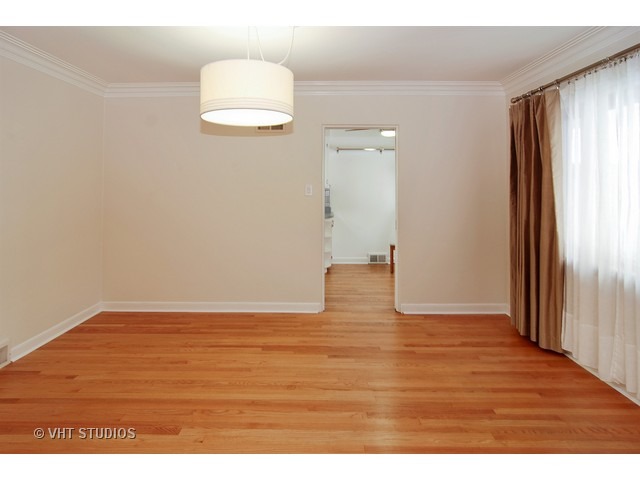 229 Blackhawk Road Riverside, IL 60546 - Photo 9 of 25 a view of an empty room and window